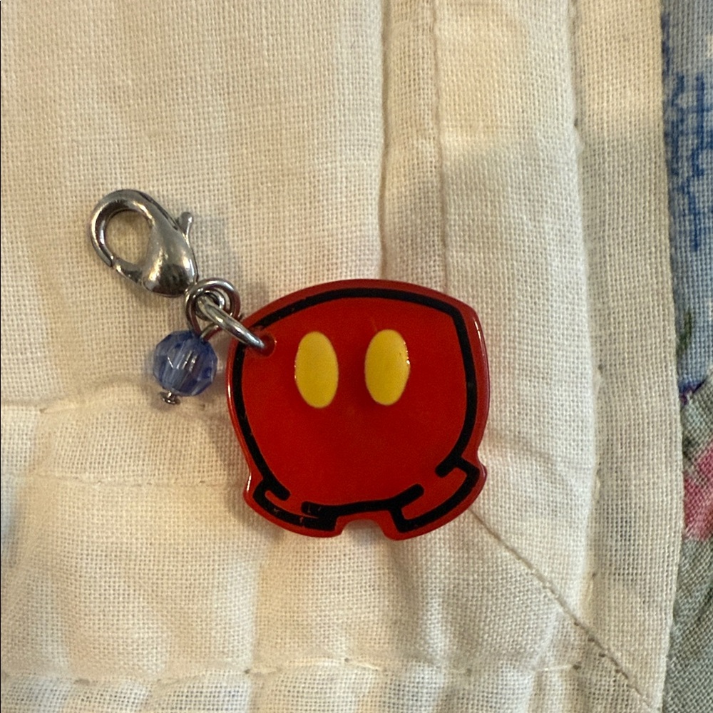 Red and Yellow Cartoon Character Charm